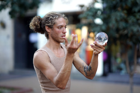 Sofia, Bulgaria October, 27, 2019 Street artist does his show with a ball on Boulevard Vitoshaのeditorial素材