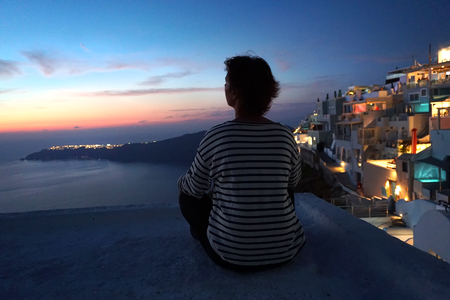 Santorini, Greece, September 21 2018, Tourist admire the sunset from Imerovigliのeditorial素材
