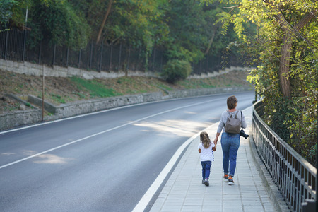 a mom and daughter walking in the streets of Veliko Tarnovo, Bulgariaのeditorial素材