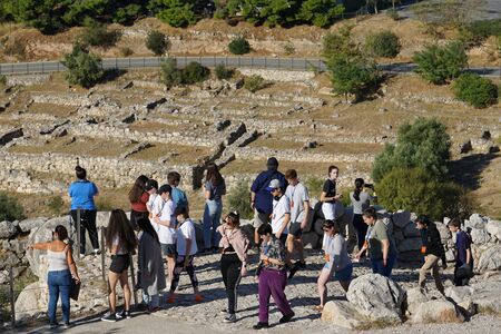 Mycenae, Greece, October 05 2019 Tourists of various nationalities visiting the archaeological site of Mycenaeの写真素材