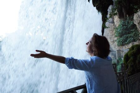 A tourist in love with famous waterfalls in Edessa, Greece