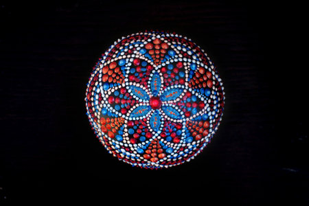 Beautiful hand painted mandala on black backgroundの写真素材