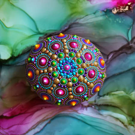 Beautiful Hand Painted Mandala on Alcohol Ink Backgroundの写真素材