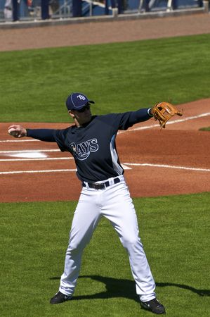 PORT CHARLOTTE, FLORIDA - MARCH 4: Evan Longoria of the Tampa Bay Rays warms up prior to a game...