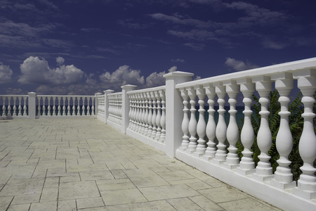White decorative fence on the waterfront of the Anapa city resort on the Black Sea coast. Blue...
