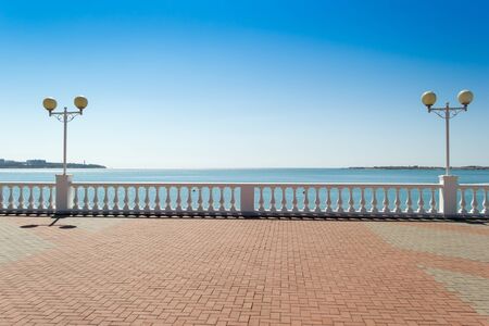 View on seascape from promenade in sunny day. Vacation concept background. Sea bay in Gelendzhik resort city, Russia.の写真素材