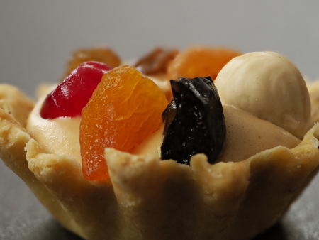 A tasty dessert in the pleasant company for tea or coffee. Close up.