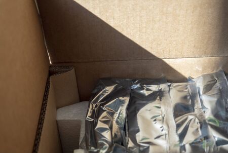 Hard drives Packed in foil are in a cardboard box