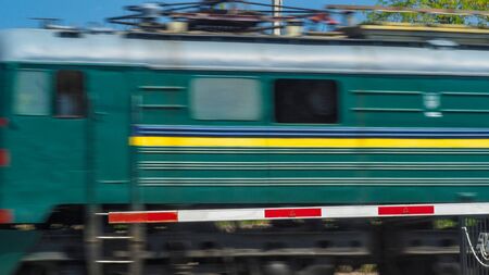 The railway crossing passes the train the barrier is closedの写真素材