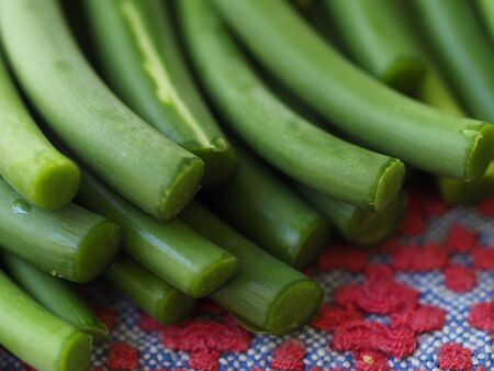 They are also known as garlic spears , stems , or tops .