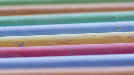 Selective focus on crayons for drawing on asphalt in different colorsの写真素材