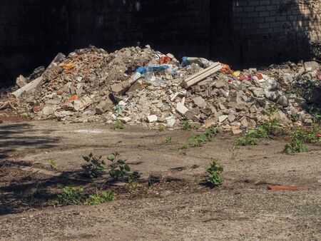 Construction debris lies in the open airの写真素材