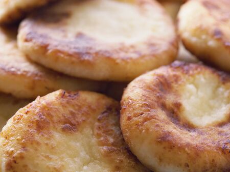 Cottage cheese pancakes cheesecakes as a backgroundの写真素材