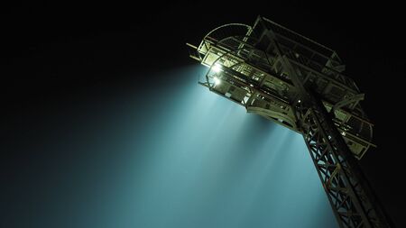 Floodlights at the stadium at nightの写真素材