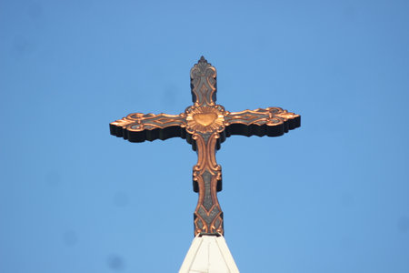 Cross on the top of the church in the city of Vilnius, Lithuaniaの写真素材