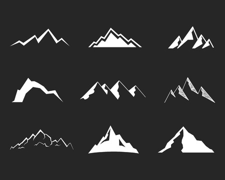 Set of mountain silhouette elements. Outdoor icon. Hand drawn snow ice mountain tops, decorative symbols isolated. Use them for camping logo, travel labels, climbing or hiking badges. Vector.のイラスト素材