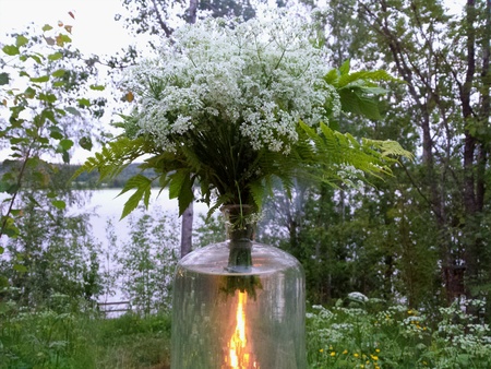 St. John's bonfire captured through flower vase.の素材
