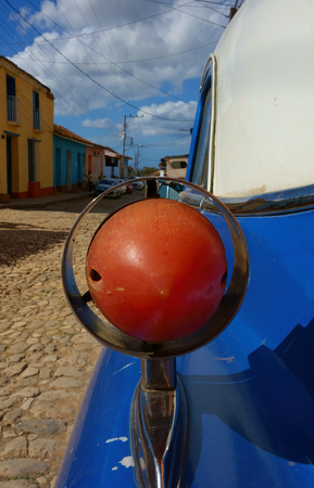 Rear light of a classic American car on street in Trinidad, Cuba on sunny day in December 2013.の写真素材