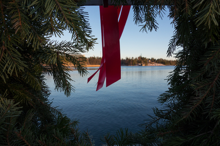 Christmas decoration and view to the Baltic Sea from the Seurasaari bridge in Helsinki, Finlandの写真素材