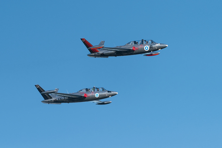 Helsinki, Finland - June 9, 2017: Two Silver Jets Aerobatic Team Fouga CM 170 Magister jets flying at the Kaivopuisto Air Show in Helsinki, Finland.のeditorial素材