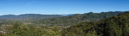 Spectacular autumn panorama view to the valley and villages of Guria region of Georgia surrounded by the Caucasus mountains.の写真素材