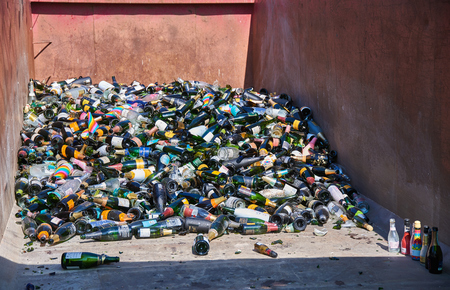 Helsinki, Finland - May 1, 2019: Pile of recycled sparkling wine bottles on a large open interchangeable platform after first of May celebrations in Kaivopuisto, Helsinki.のeditorial素材