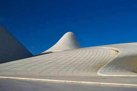Baku, Azerbaijan - February 4, 2020: Abstract design of the Heydar Aliyev Center landmark in Baku Azerbaijan designed by Zaha Hadid that serves as a cultural and conference center, library and museum.のeditorial素材