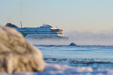 Helsinki, Finland - December 5, 2021: Tallink M/S Megastar ferry departing to Tallinn from Helsinki in extremely cold winter conditions.のeditorial素材