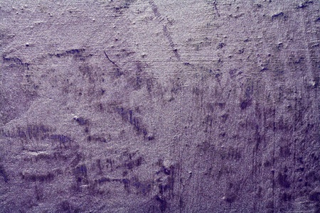 detail of a concrete wall painted in purpleの写真素材
