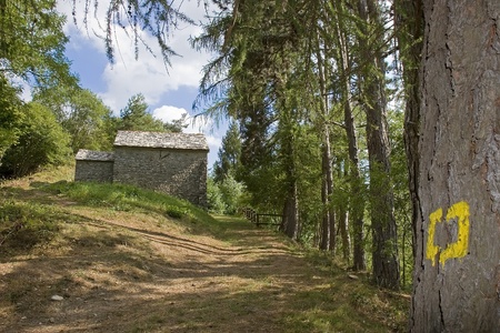 an ancient stone church in the woods of the italian appenineの写真素材