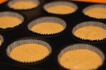 Muffins in a pan, ready for oven.の写真素材