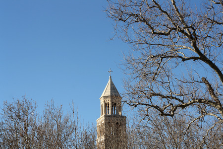 Saint Domnius bell tower in Split, surrounded with bare tree branches.の写真素材