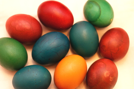 Pile of colorful Easter eggs on white background.の写真素材