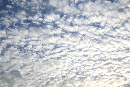 Small thick clouds covering the sky.