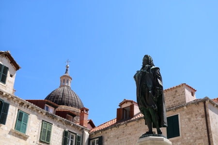 Historical statue of poet Ivan Gundulic in Gundulic Square, Old Town Dubrovnik. Dubrovnik is famous touristic location in Croatia and UNESCO World Heritage Site.のeditorial素材