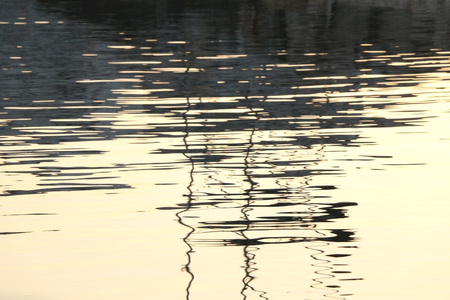 Sunset light reflects in the sea. Abstract background.の写真素材