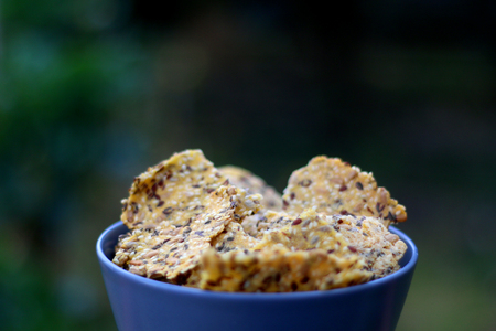 Healthy gluten free crackers made with cornflour, flax seeds, sesame, sunflower seeds, olive oil,...