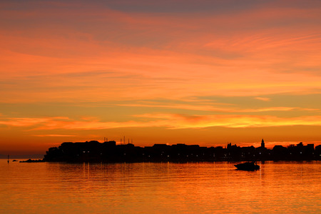 Sunset in small coastal town Stobrec near Split, Croatia.の写真素材