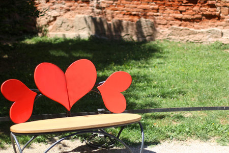 Heart shaped bench in picturesque Tkalciceva Street in Zagreb, Croatia. Selective focus.のeditorial素材