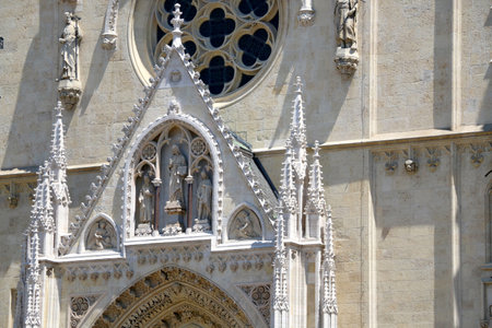 The Cathedral of the Assumption of the Blessed Virgin Mary on Kaptol - landmark in Zagreb, Croatia. Entrance detail with statues and carvings.のeditorial素材