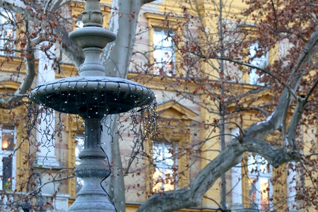Festive decorations on a fountain in park Zrinjevac, in Zagreb, Croatia. Selective focus.の写真素材
