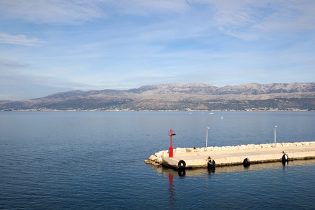 Solar powered lighthouse on a dok in Supetar, Brac island, Croatia.