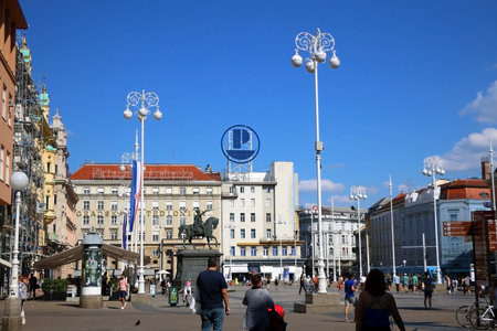 Zagreb, Croatia - June 19, 2017: Tourists and locals enjoying suny summer day on Ban Jelacic Square in Zagreb, Croatia.のeditorial素材