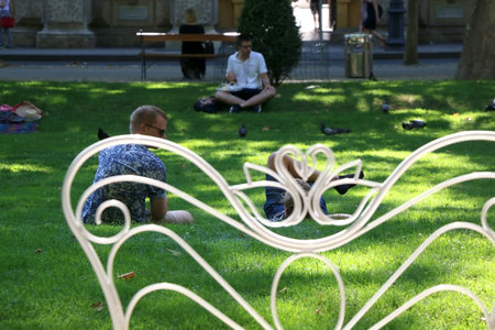 Zagreb, Croatia - June 20, 2017: Details in park Zrinjevac, in central Zagreb, Croatia. Tourists and locals ejoying sunny summer day in the park.のeditorial素材