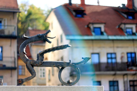 Ljubljana, Slovenia - October 30, 2017: Abstract sculpture of dragons on Ljubljanica river in central Ljubljana, Slovenia. Dragon is symbol of Ljubljana.のeditorial素材