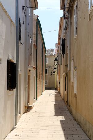 Picturesque narrow streets of town Pag, on island Pag, Croatia.の写真素材