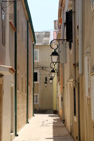 Picturesque narrow streets of town Pag, on island Pag, Croatia.の写真素材