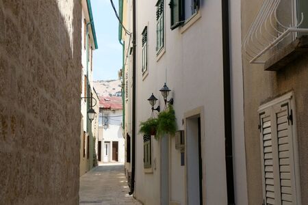 Picturesque narrow streets of town Pag, on island Pag, Croatia.の写真素材