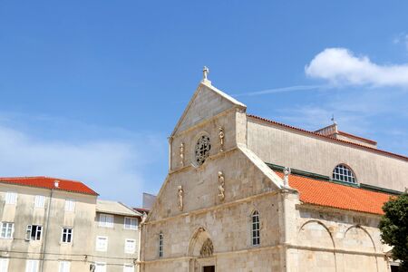 Historic Church of the Assumption on main square in town Pag, island Pag, Croatia.の写真素材