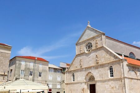 Historic Church of the Assumption on main square in town Pag, island Pag, Croatia.の写真素材
